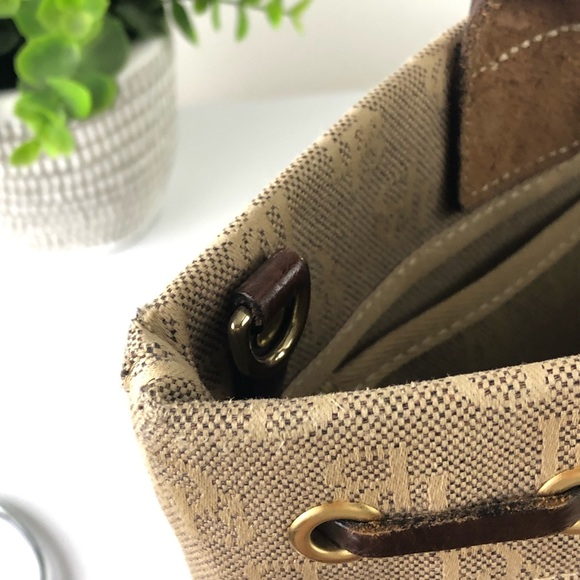 Dooney & Bourke Signature Logo Canvas/Leather Tassel Bag - Picture 12 of 16